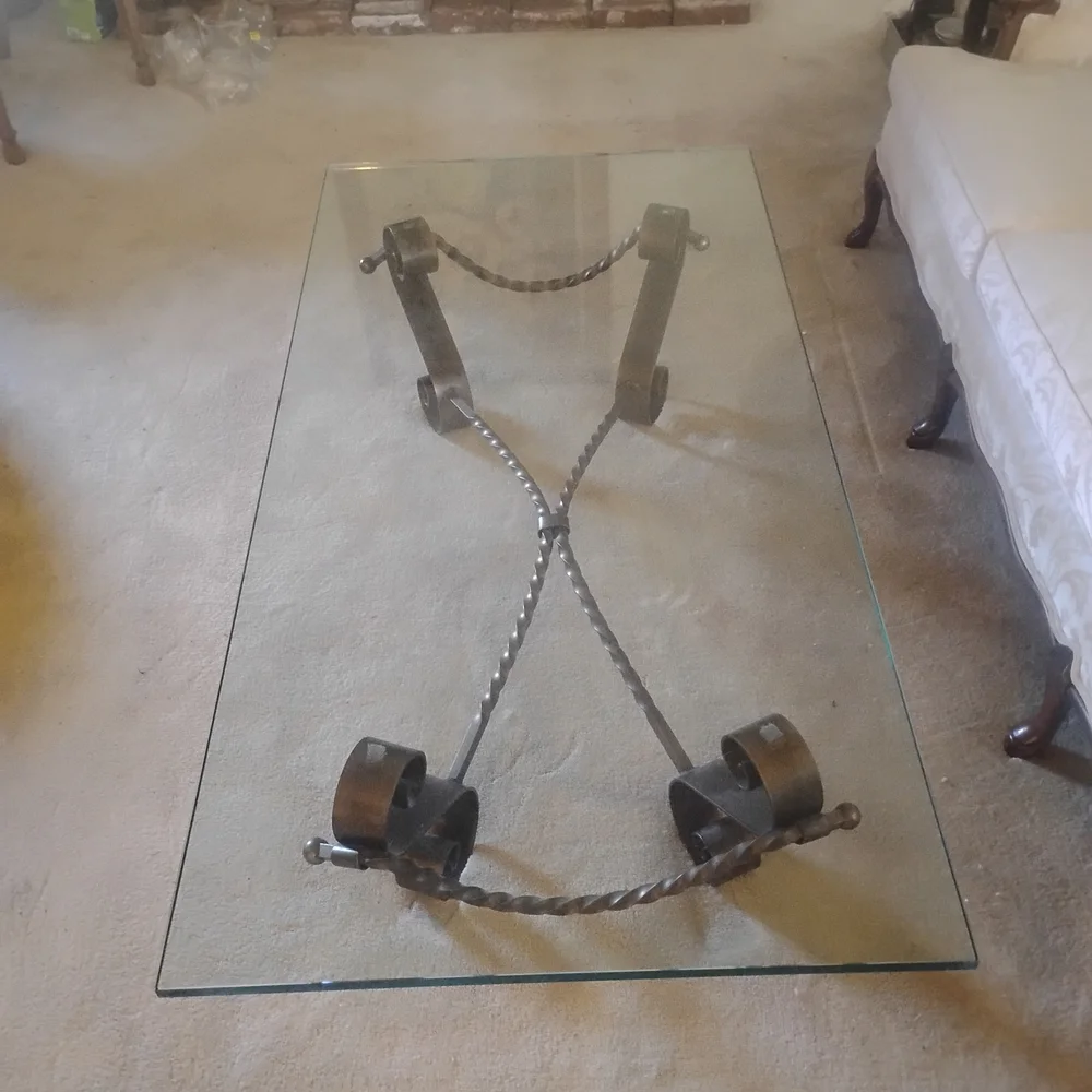 Elegant Glass Coffee Table with Black Metal Accents